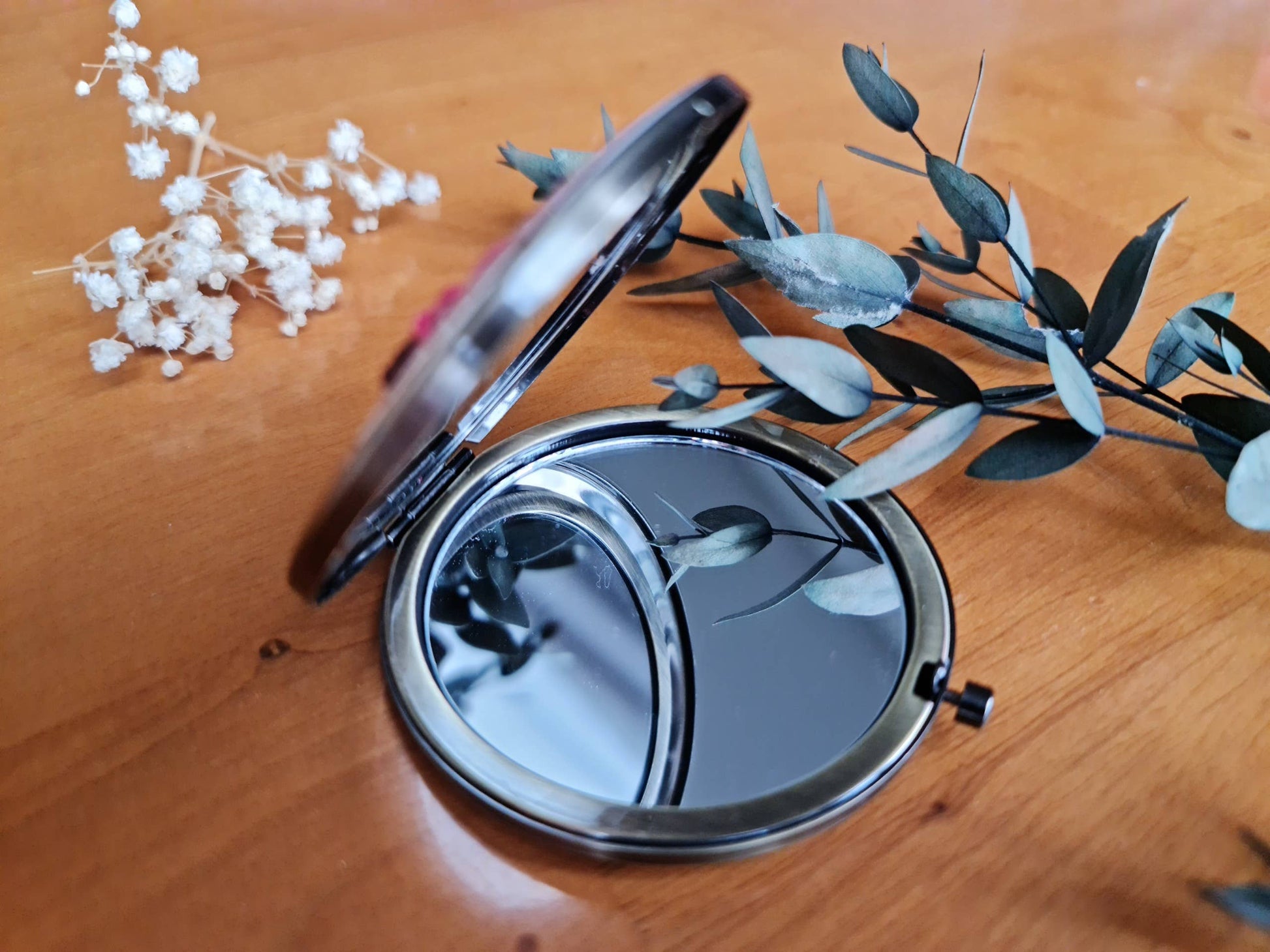 Open Floral Compact Mirror from Sophia Collection showing dual mirrors, stainless steel frame, elegant beauty tool for daily use.