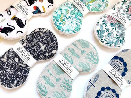 Assorted cotton sleep masks including the Saguaro design with cactus print, perfect for gifting and enhancing sleep quality.