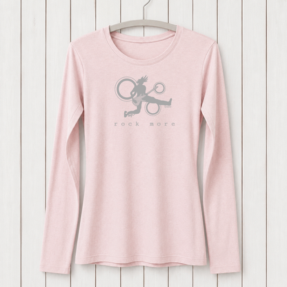 Light pink women's long sleeve T-shirt with a graphic of a rock musician playing guitar, hanging on a white wooden wall, eco-friendly fashion