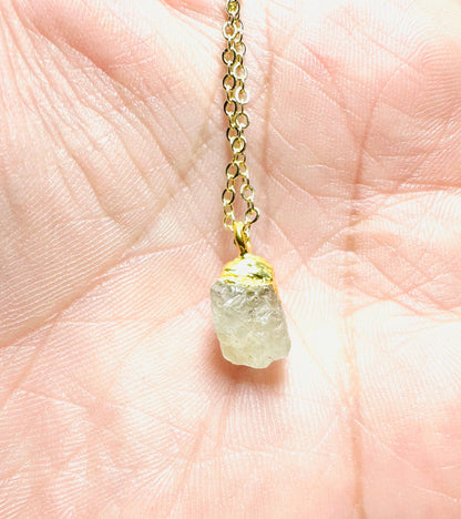 Raw aquamarine gemstone necklace with gold-dipped top on brass chain. Elegant and affordable gift by UNI-T Jewelry.
