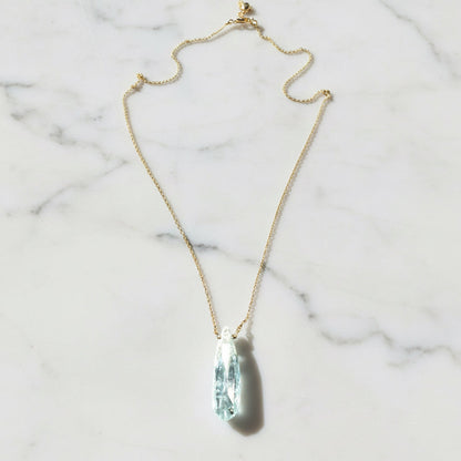 Gold chain necklace with aquamarine pendant
