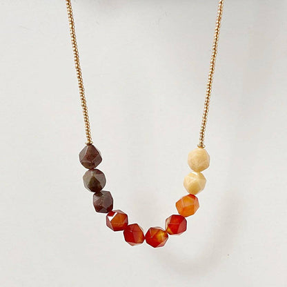 Uni-T Design Beaded Carnelian Necklace with symmetrical gemstone arrangement and gold seed bead chain, perfect for everyday wear or gifting.