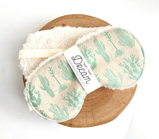 Sleep Mask Saguaro by Little Man featuring green cactus print on beige cotton with soft Sherpa backing, ideal for relaxation and sleep aid.