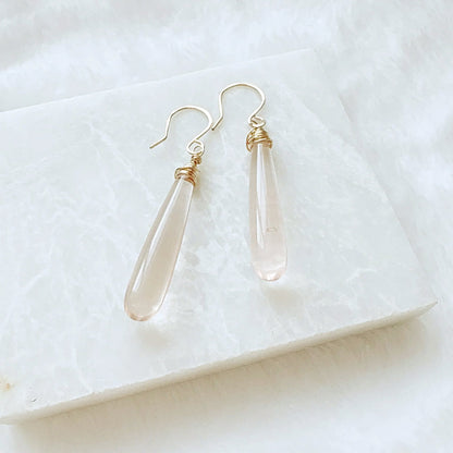 Elegant pink gemstone teardrop earrings with gold wire wrapping