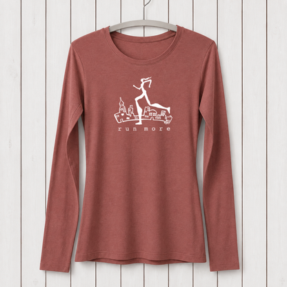 Rust-colored women's long sleeve T-shirt made from bamboo organic cotton with a graphic of a running woman over cityscape, perfect for active lifestyles.