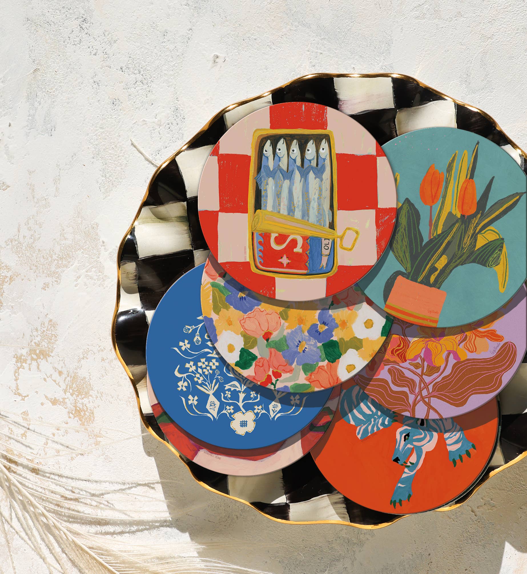 Sardines Seedlings Coaster displayed among other colorful coasters on a decorative plate, perfect for gifting or entertaining.