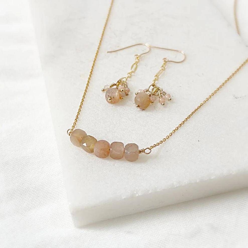 Dainty Gemstone Gold Earrings Necklace Set with faceted peach moonstone beads on an 18-inch gold chain and matching drop earrings.