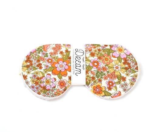 Sweet Dreams Cotton Sleep Mask featuring a colorful groovy floral design and soft cotton band, ideal for restful sleep and travel.