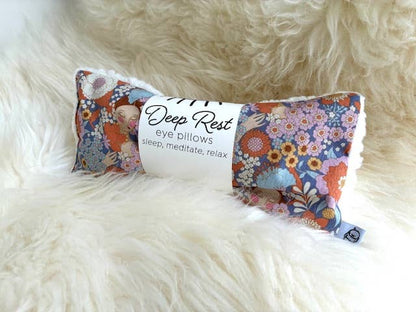 Floral eye pillow on fluffy white background