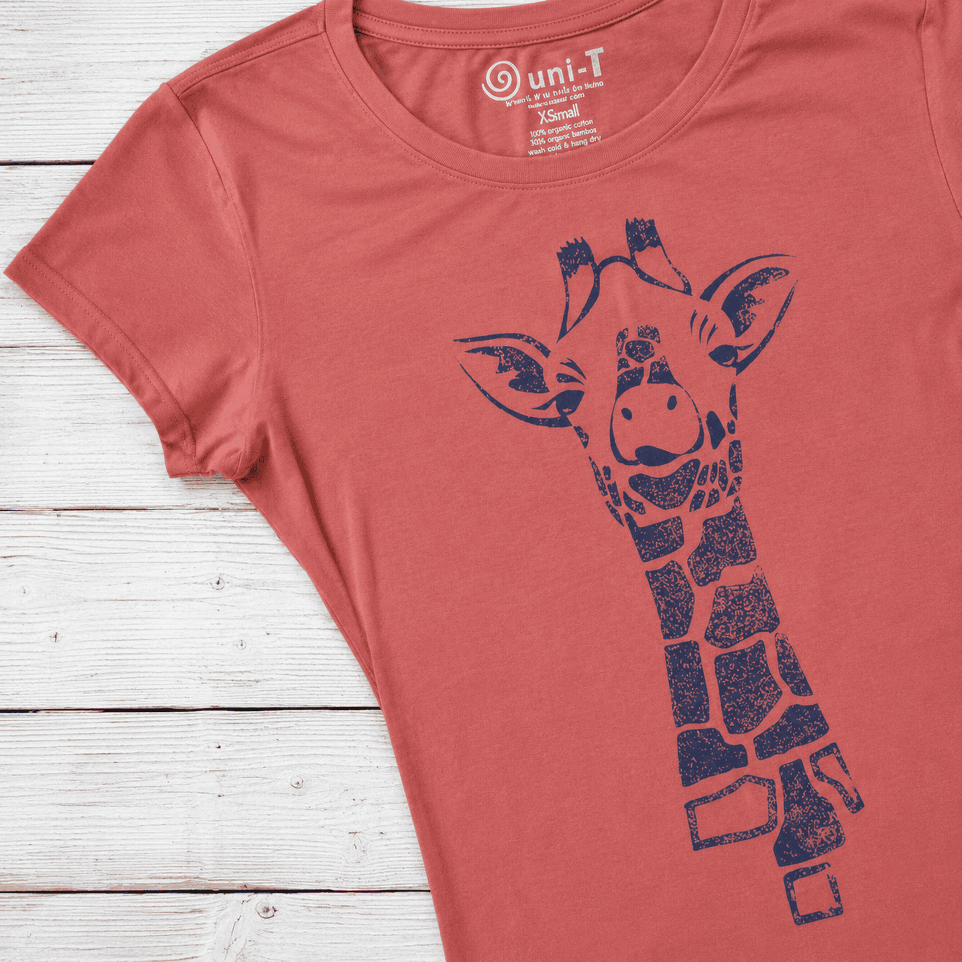 Coral pink women's T-shirt made of organic cotton and bamboo with a navy blue giraffe graphic print, casual style, size XS-Small