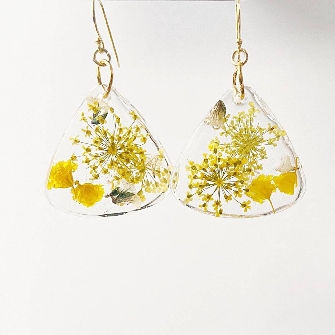 Triangle resin earrings with yellow flowers and gold hooks. Botanical style from the Pressed Flower Earrings - Real Flowers line.