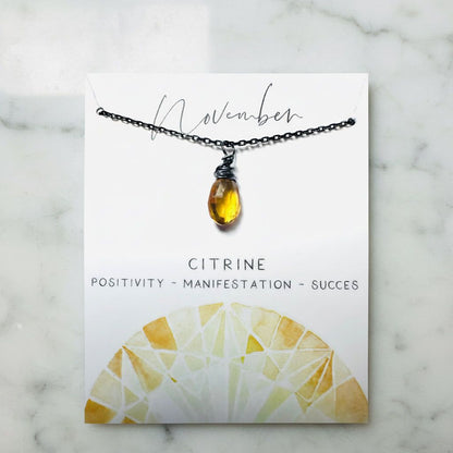 Citrine gemstone necklace on card