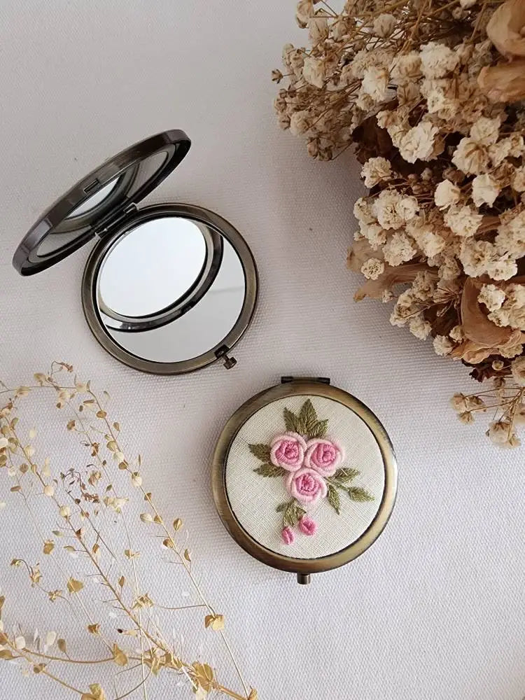 Compact mirror from Sophia Collection with pink rose embroidery on cream linen, elegant and practical gift for mom or wife.