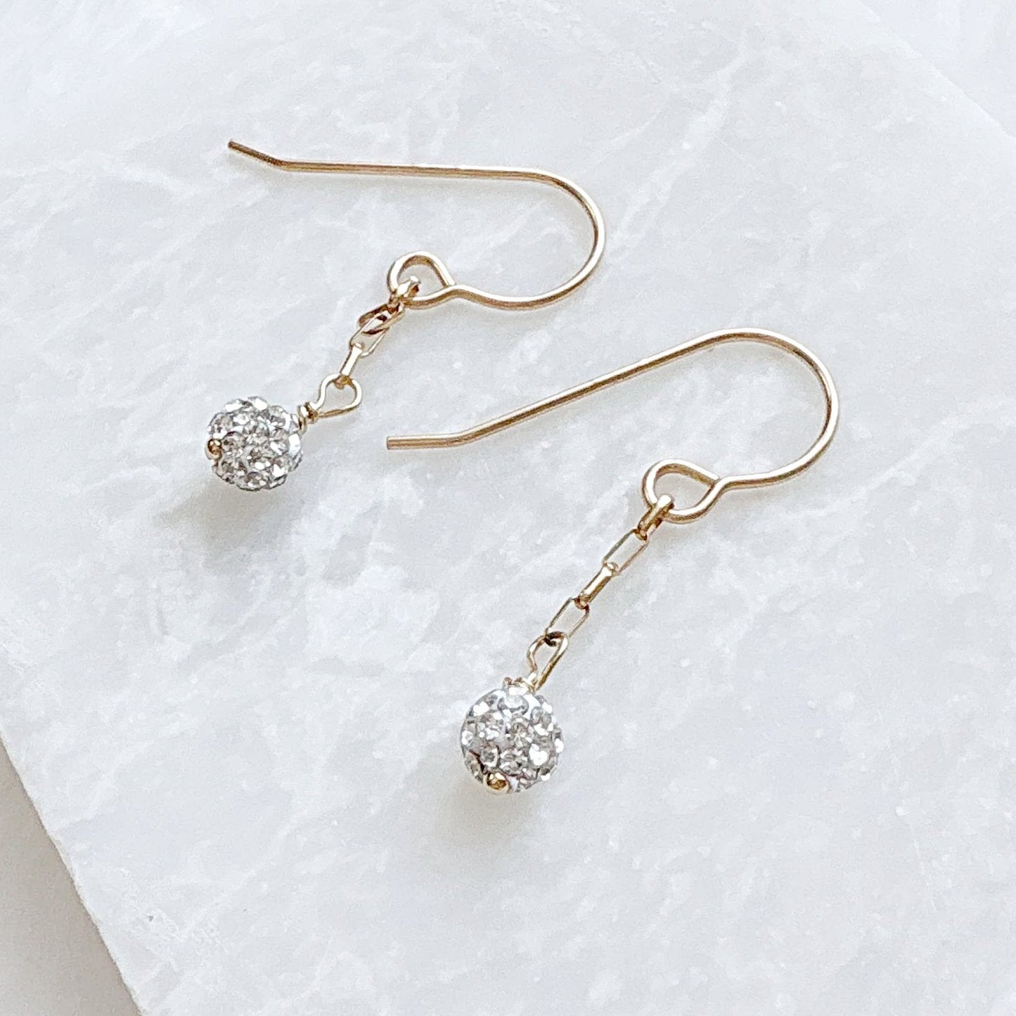 Sterling silver crystal dangle earrings with sparkling crystal ball accents