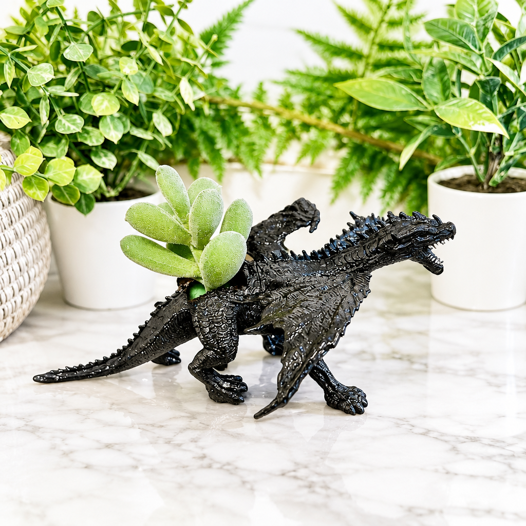 66a52de5c47c9c3ce95361c2_black-dragon-animal-planter-side_1790451207784.png