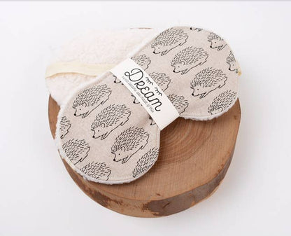 Sweet Dreams Sleep Mask - Linen Hedge Hog design made from 100% cotton with soft minky backing, displayed on a wooden platform.