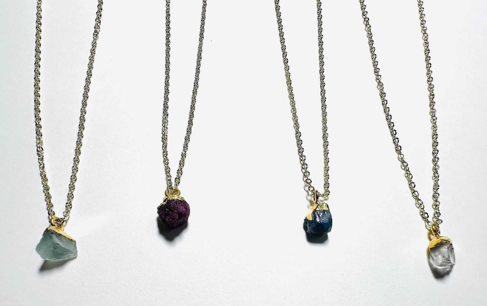 Silver chain with raw gemstone pendant jewelry