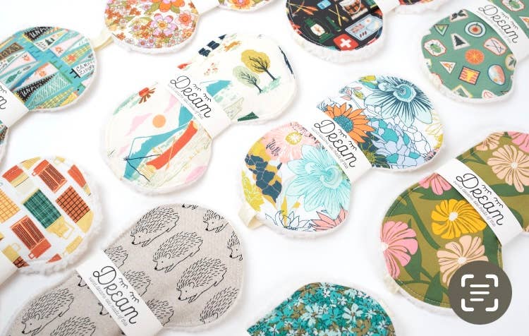 Assorted Groovy Sleep Masks in various colorful patterns, all made from 100% cotton with soft minky backing, perfect for home or travel.