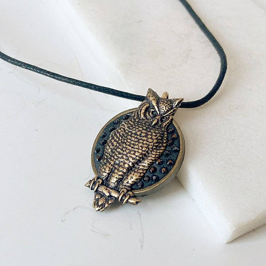 Handmade Owl Necklace in vintage brass with crystal mosaic detailing, featuring an owl totem pendant on a black leather cord.