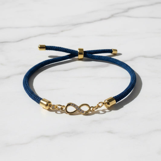Black cord bracelet with eye charm