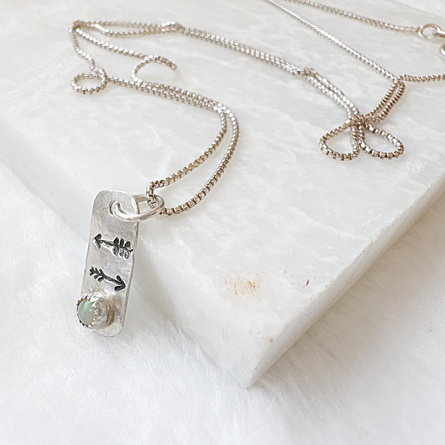 Silver Opal Arrow Tag Necklace with engraved arrows and opal gemstone