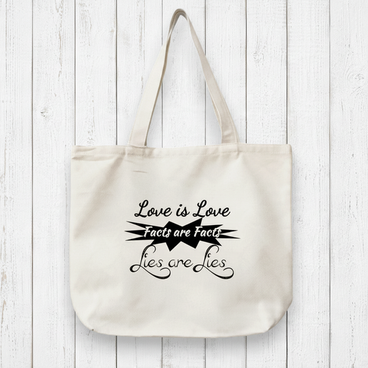 Uni-T organic cotton canvas tote bag in natural beige with black Love Truth Facts graphic print on white wood wall