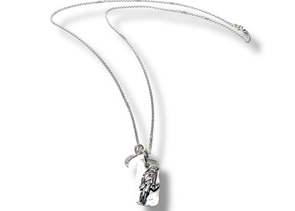 Silver chain necklace with engraved pendant and moon charm