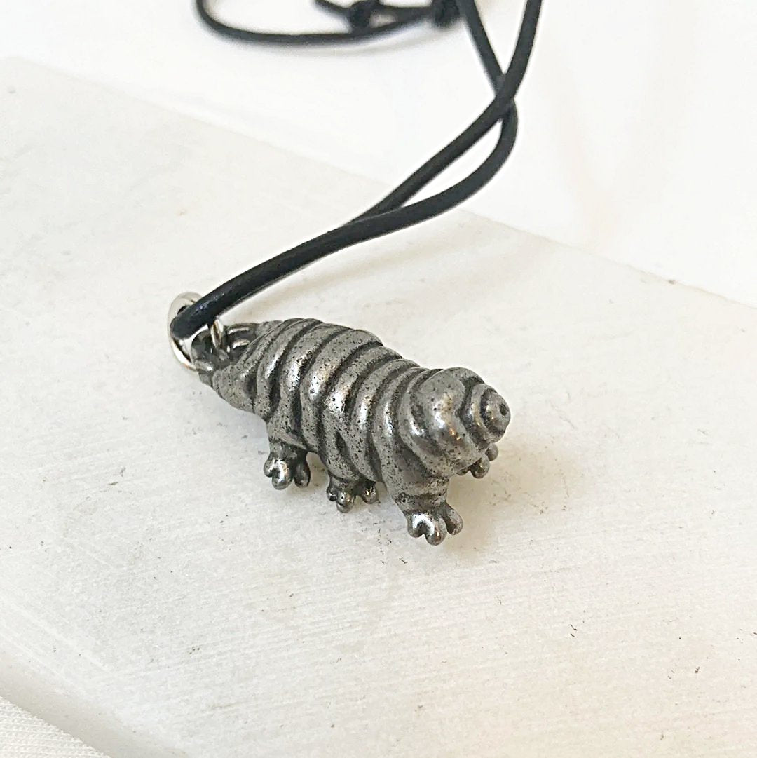 3D-style Tardigrade Necklace with a sculpted silver water bear charm. Unique design for science and nature-inspired jewelry fans.