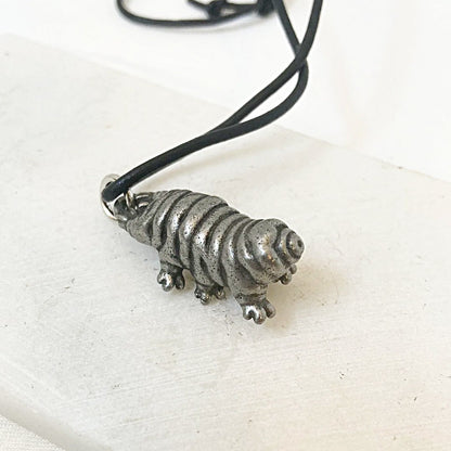 3D-style Tardigrade Necklace with a sculpted silver water bear charm. Unique design for science and nature-inspired jewelry fans.