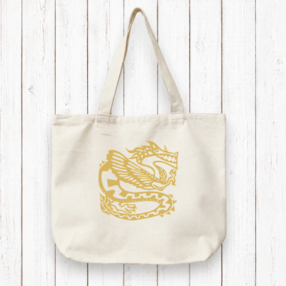 Dragon canvas tote bag made from organic cotton featuring an ancient dragon artist design, ideal fantasy gift for eco-conscious shoppers.
