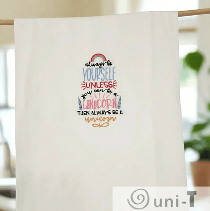 Unicorn Embroidered Towel - Embrace Your True Self featuring colorful stitching and playful typography, perfect for unicorn lovers' kitchens.