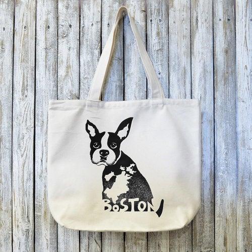 Boston Pride Tote Bag - Organic Design featuring a black Boston Terrier illustration with 'Boston' text on eco-friendly canvas. Ideal for city lovers.