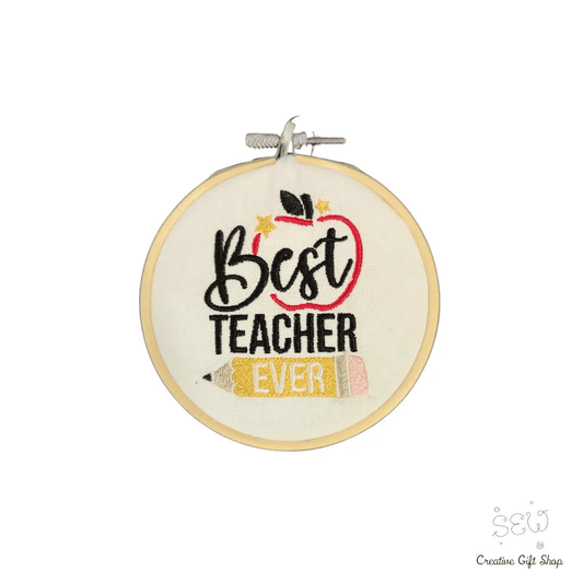 Best Teacher Ever Ornament with embroidered apple and pencil design on fabric hoop. Perfect small gift for holiday teacher appreciation.