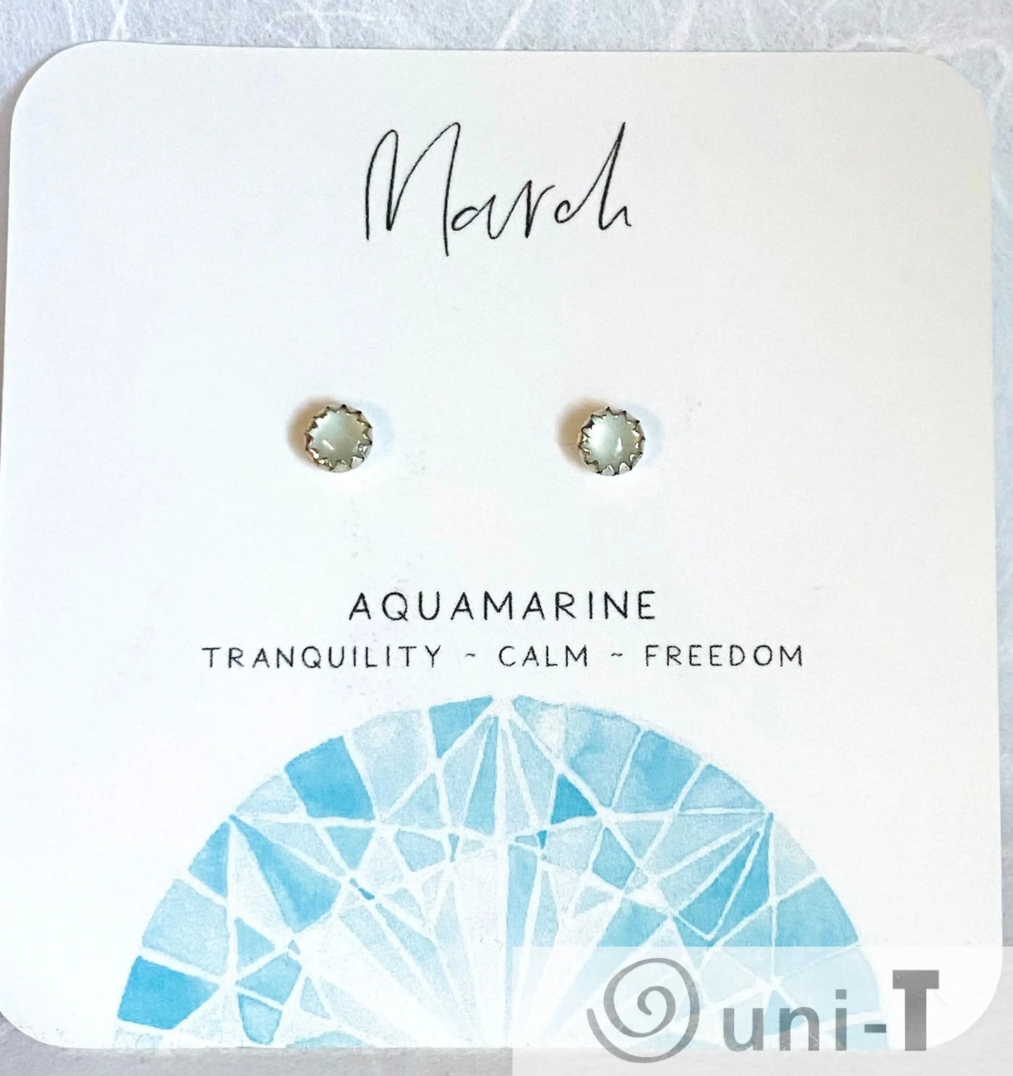 March birthstone aquamarine silver studs representing tranquility and freedom, handcrafted with genuine gemstones for elegant gifting.