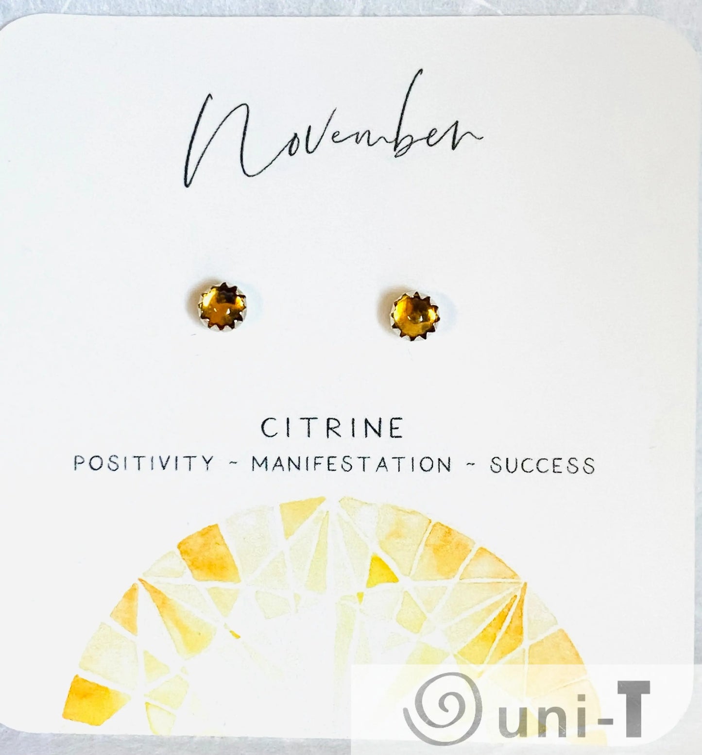 November birthstone citrine silver studs with golden yellow gemstones, representing positivity and success, great for gifting.