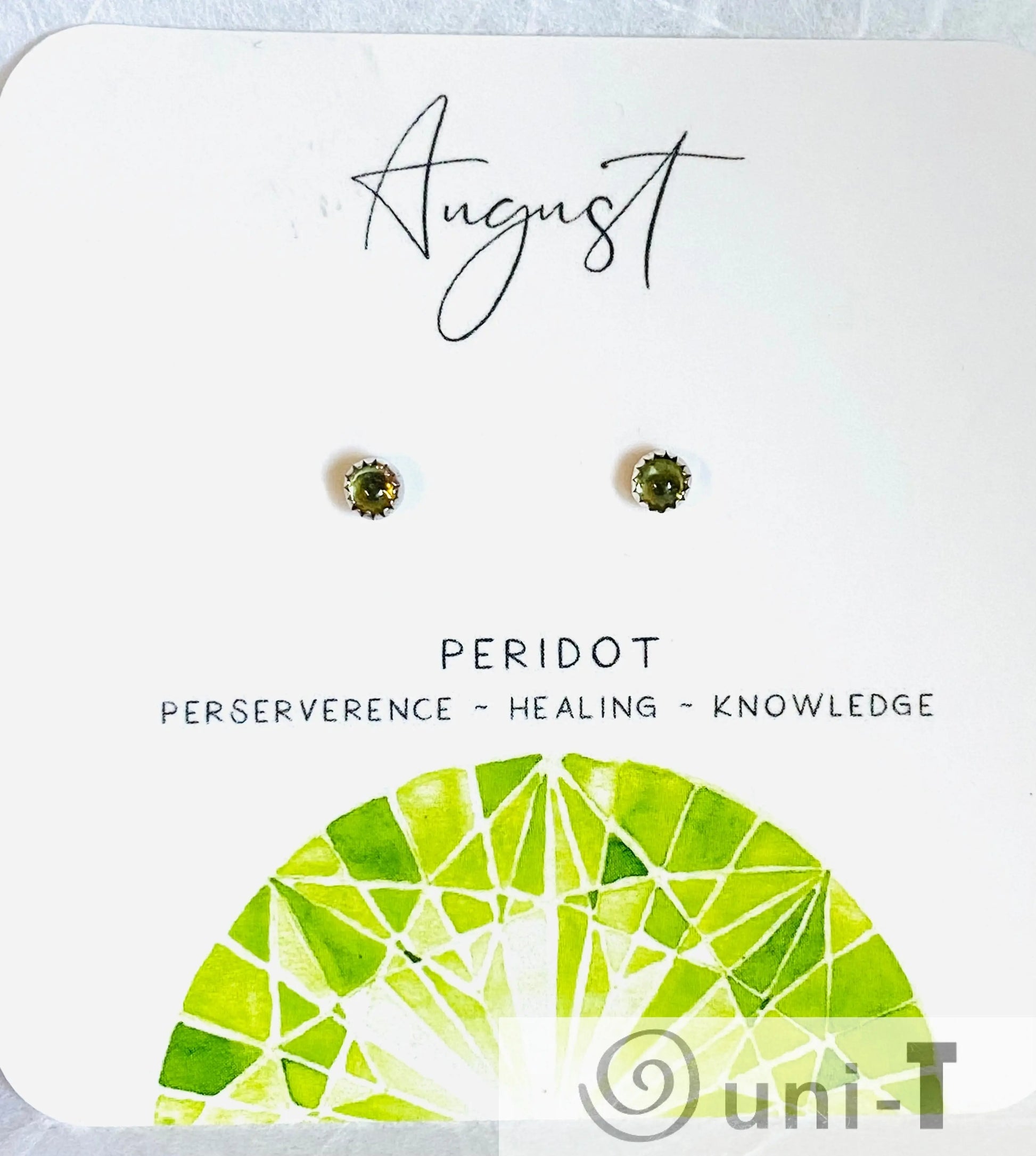 August birthstone peridot silver studs featuring olive green gemstones, symbolizing healing and knowledge, perfect for personal jewelry.