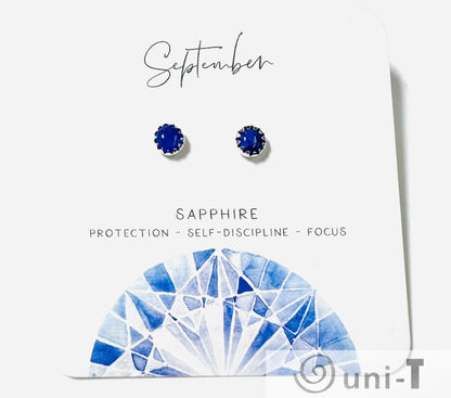 September sapphire birthstone silver studs with vibrant blue gemstones, handcrafted for focus and protection symbolism.