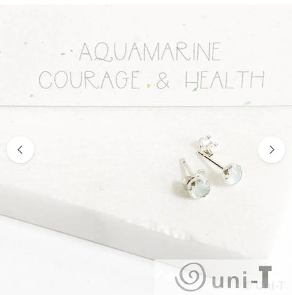 Aquamarine silver stud earrings on display card, symbolizing courage and health, perfect for March birthday gifts.
