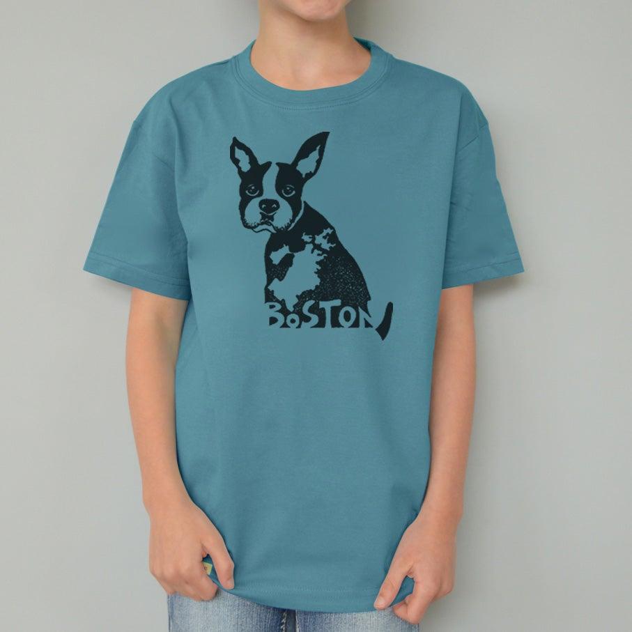 Child wearing Kids' Boston Terrier Organic Cotton T-Shirt in teal blue featuring a black puppy graphic and 'Boston' text, sustainable pet-themed top.