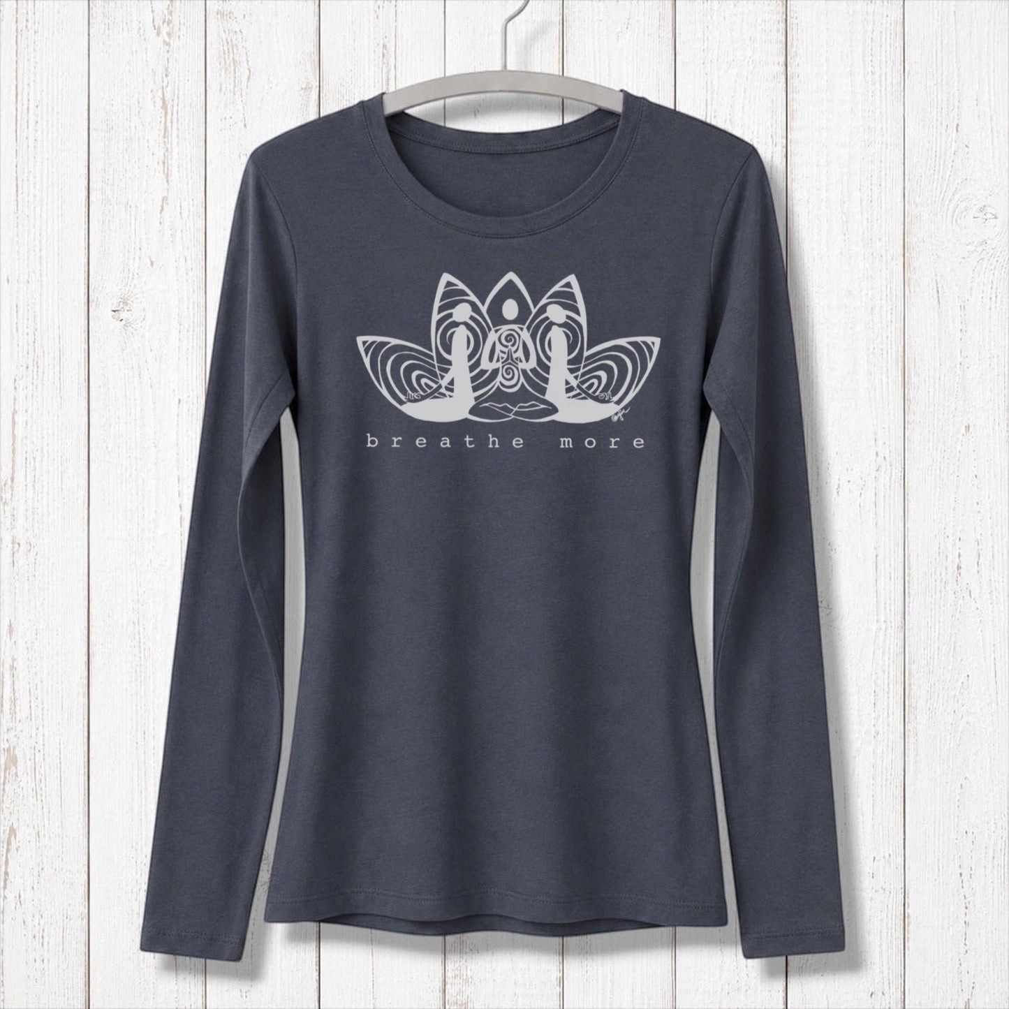 Women's meditation long sleeve T-shirt in navy bamboo and organic cotton with 'Breathe More' lotus graphic. Ideal for yoga and mindfulness wear.