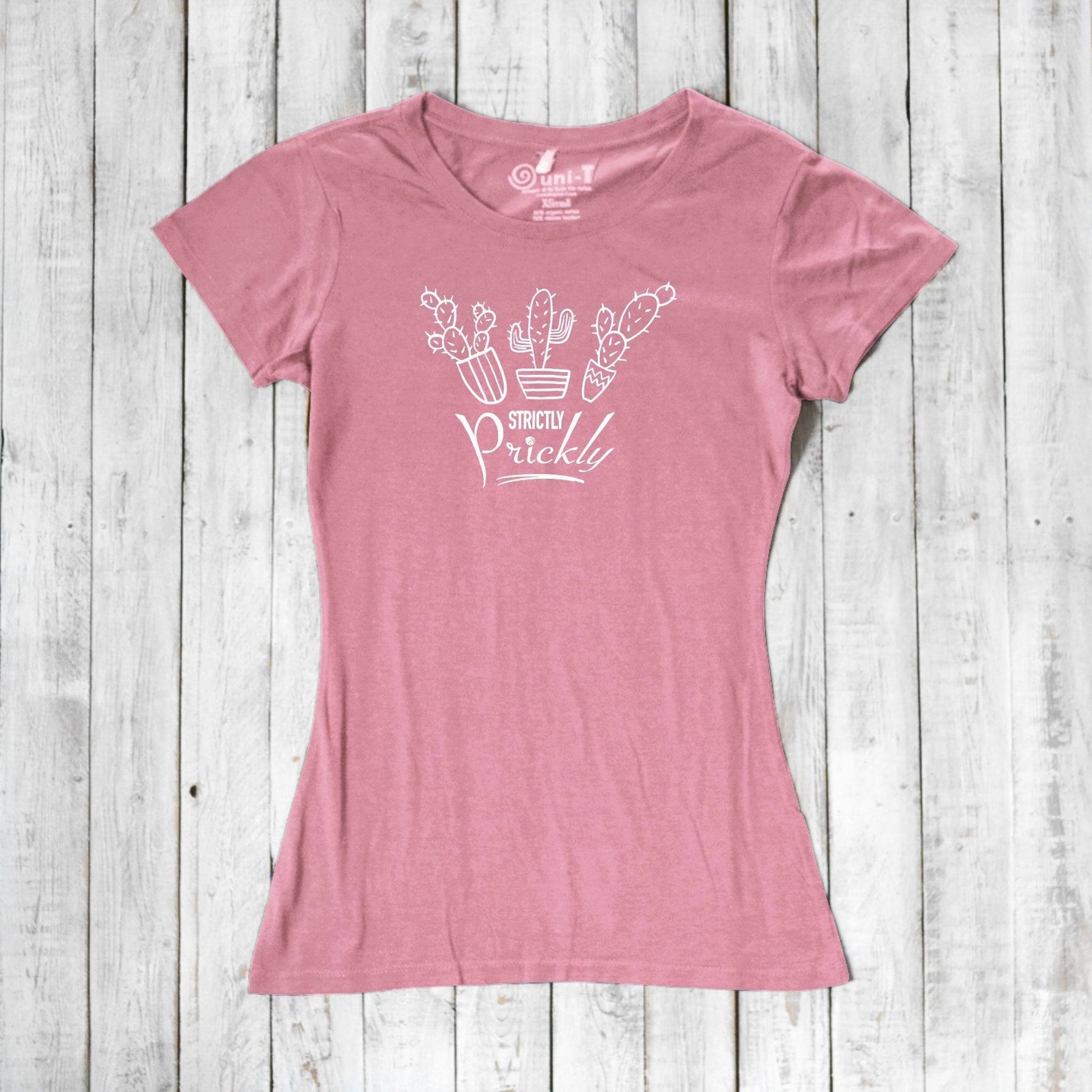 Pink cactus t-shirt for women featuring white 'Strictly Prickly' design. Soft bamboo and organic cotton fabric for sustainable wear.