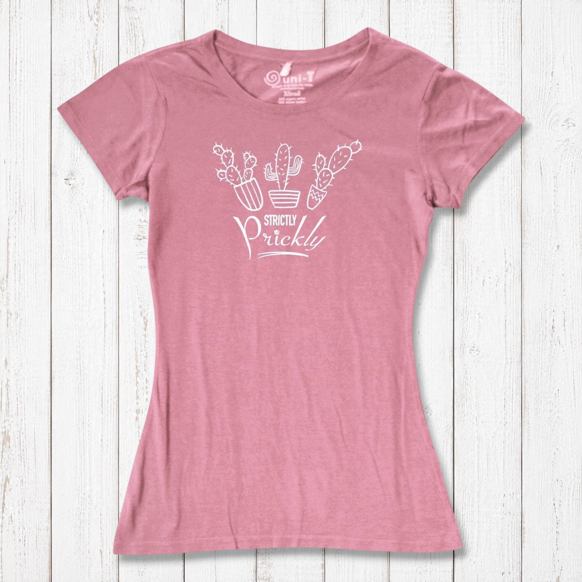 Pink cactus t-shirt for women featuring white 'Strictly Prickly' design. Soft bamboo and organic cotton fabric for sustainable wear.