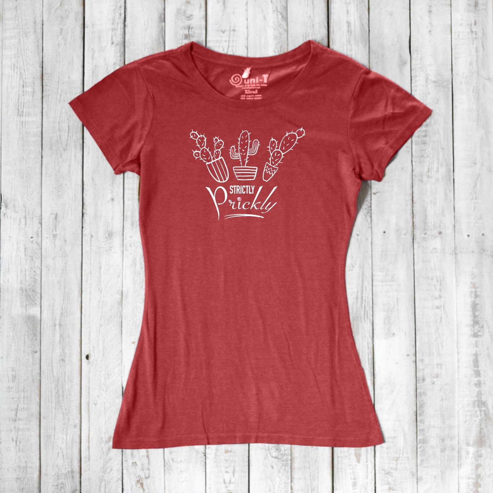 Red cactus t-shirt for women with white 'Strictly Prickly' graphic. Eco-friendly blend of bamboo and organic cotton for sustainable fashion.