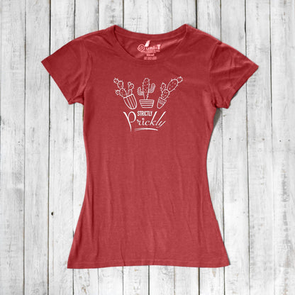 Red cactus t-shirt for women with white 'Strictly Prickly' graphic. Eco-friendly blend of bamboo and organic cotton for sustainable fashion.