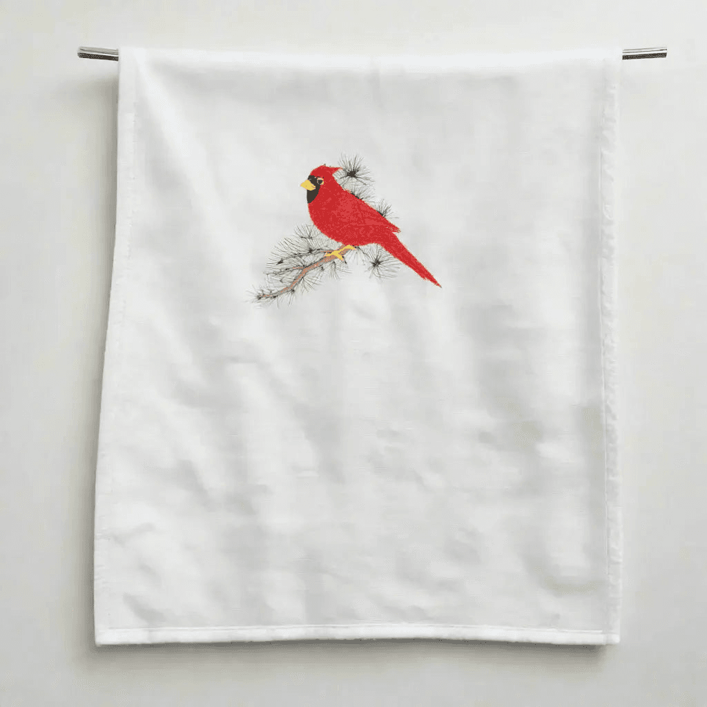 Cardinal Embroidered Towel - Nature Decor | Quality Material hanging neatly to showcase the red cardinal design on white fabric.