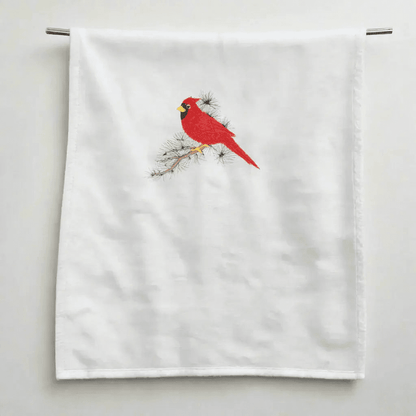 Cardinal Embroidered Towel - Nature Decor | Quality Material hanging neatly to showcase the red cardinal design on white fabric.