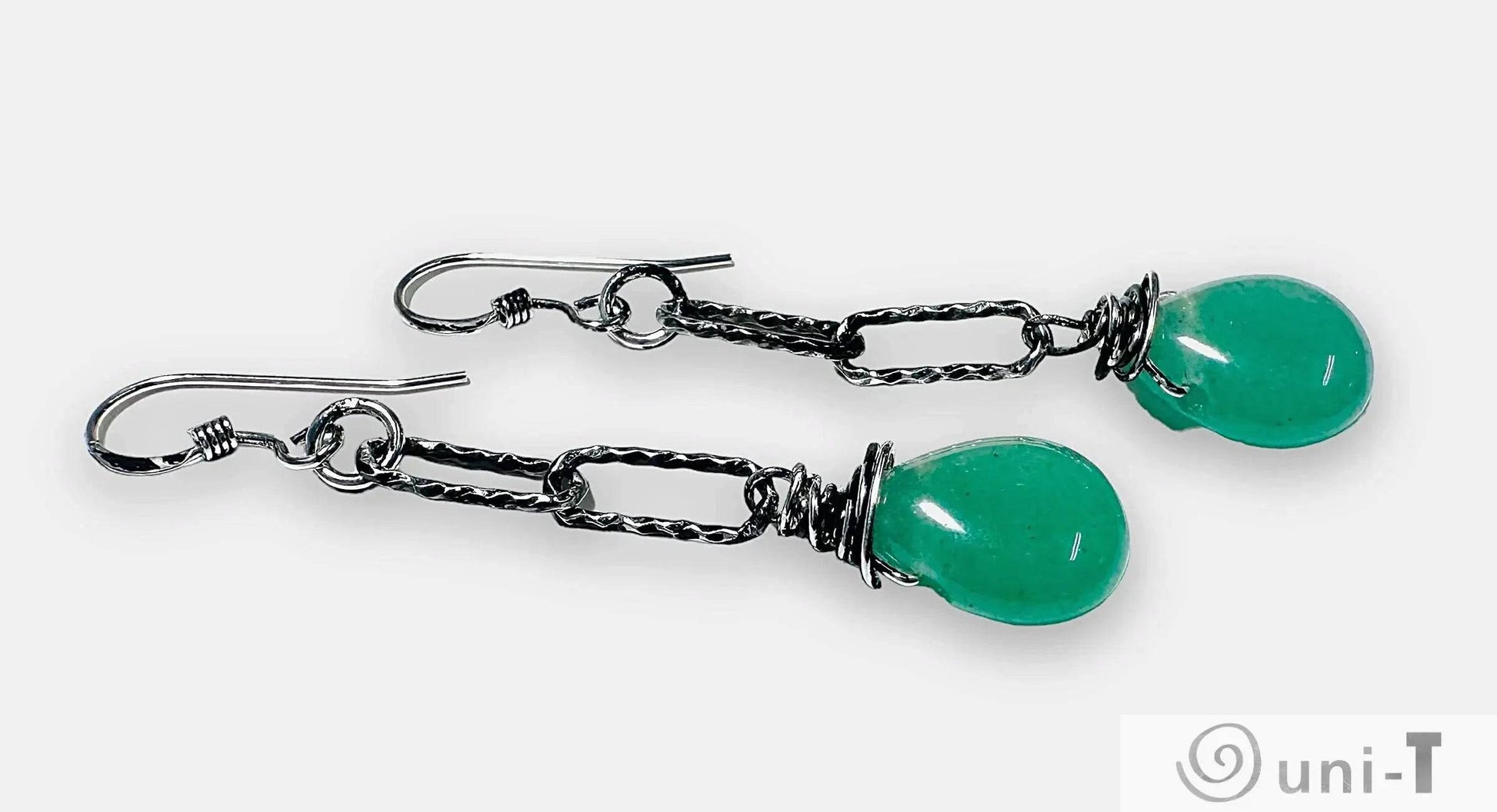 Sterling silver green chalcedony earrings featuring textured chain links and teardrop gemstones, ideal for stylish jewelry lovers.