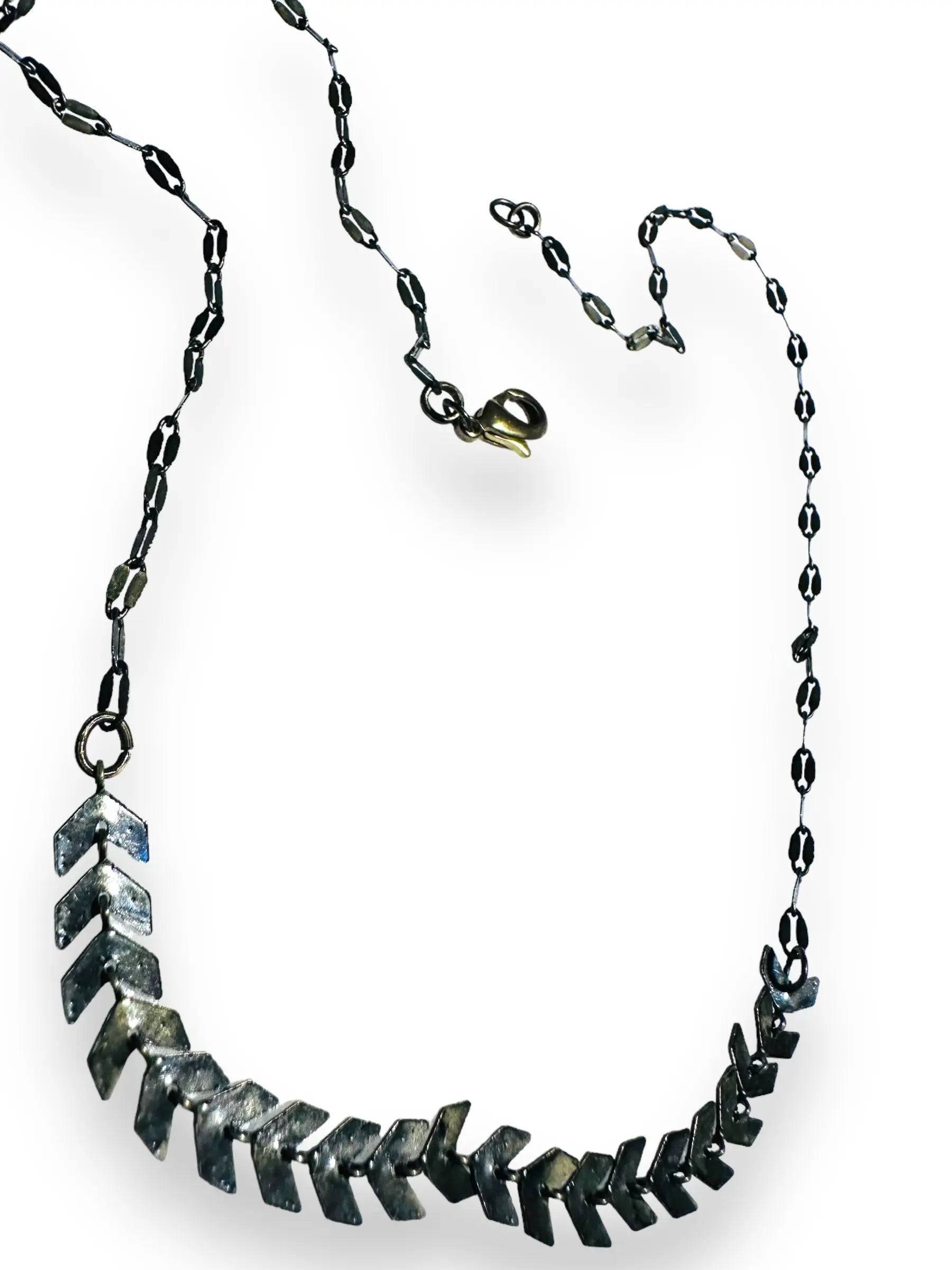 Chevron Brass Necklace - 16-Inch Length with antique finish, designed with chevron-shaped brass accents and a lobster clasp closure.