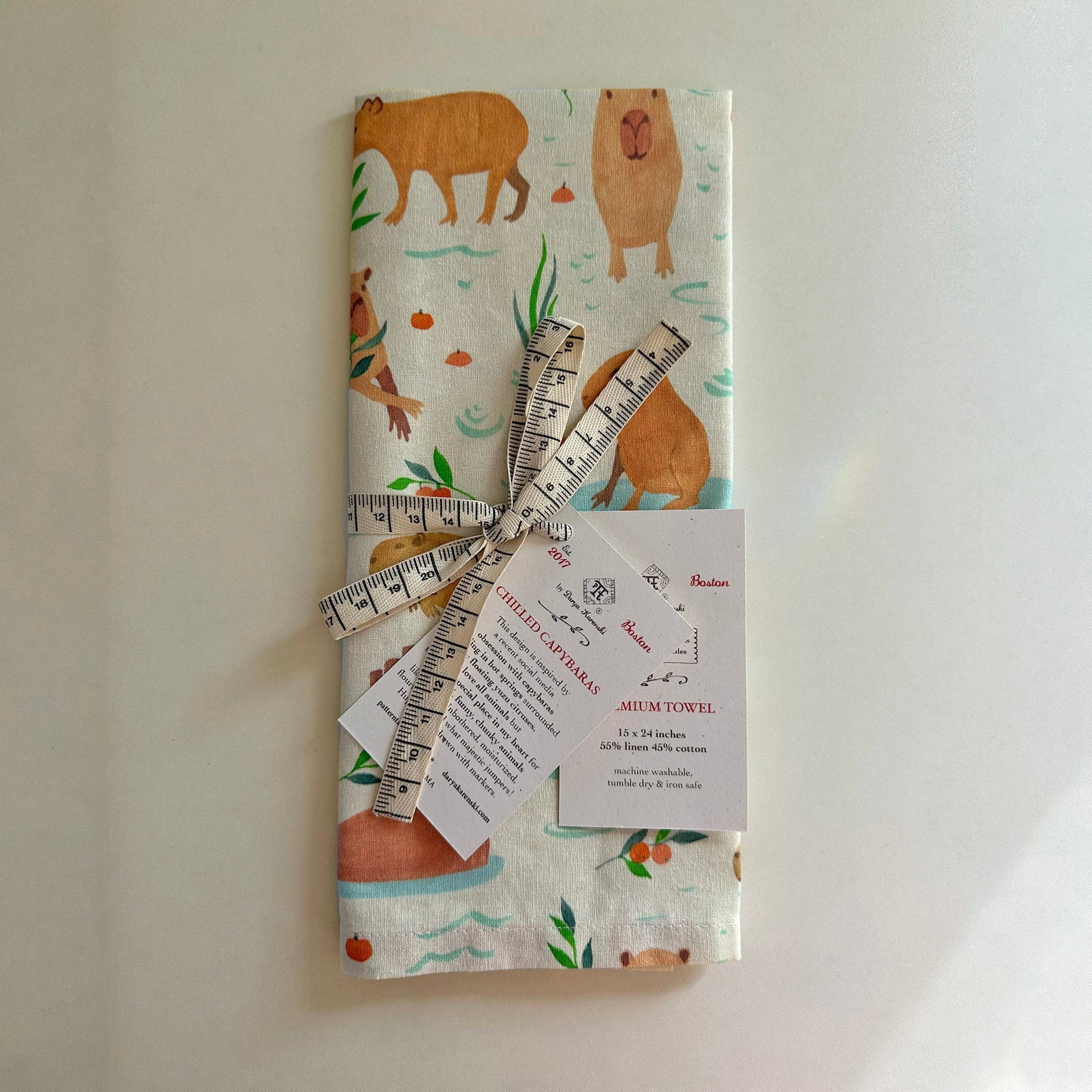 Capybaras pattern kitchen towel on table