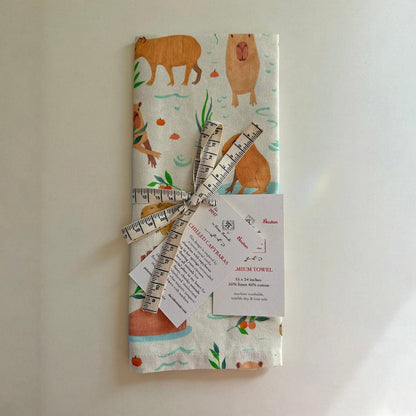 Capybaras pattern kitchen towel on table